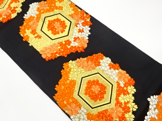 Woven pouch obi with tortoiseshell and cherry blossom design